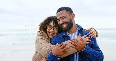 Buy stock photo Beach, love and happy couple hug, smile and travel together on marriage partner vacation, holiday or outdoor wellness. Freedom, tropical nature and relax man, woman or people embrace, support or care