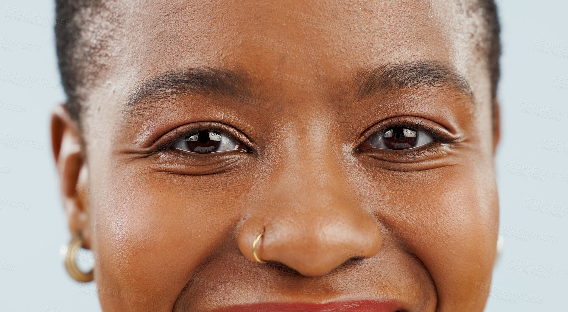 Buy stock photo Happy, eyes and portrait of black woman on blue background for confidence, pride and beauty. Cosmetics, closeup and face of African person smile with happiness, makeup and dermatology in studio