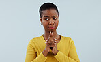 Doubt, wish and black woman in studio with fingers crossed for opportunity, deal or good news prayer. Praying hands, thinking and person with ideas, hope and faith on white background with confusion