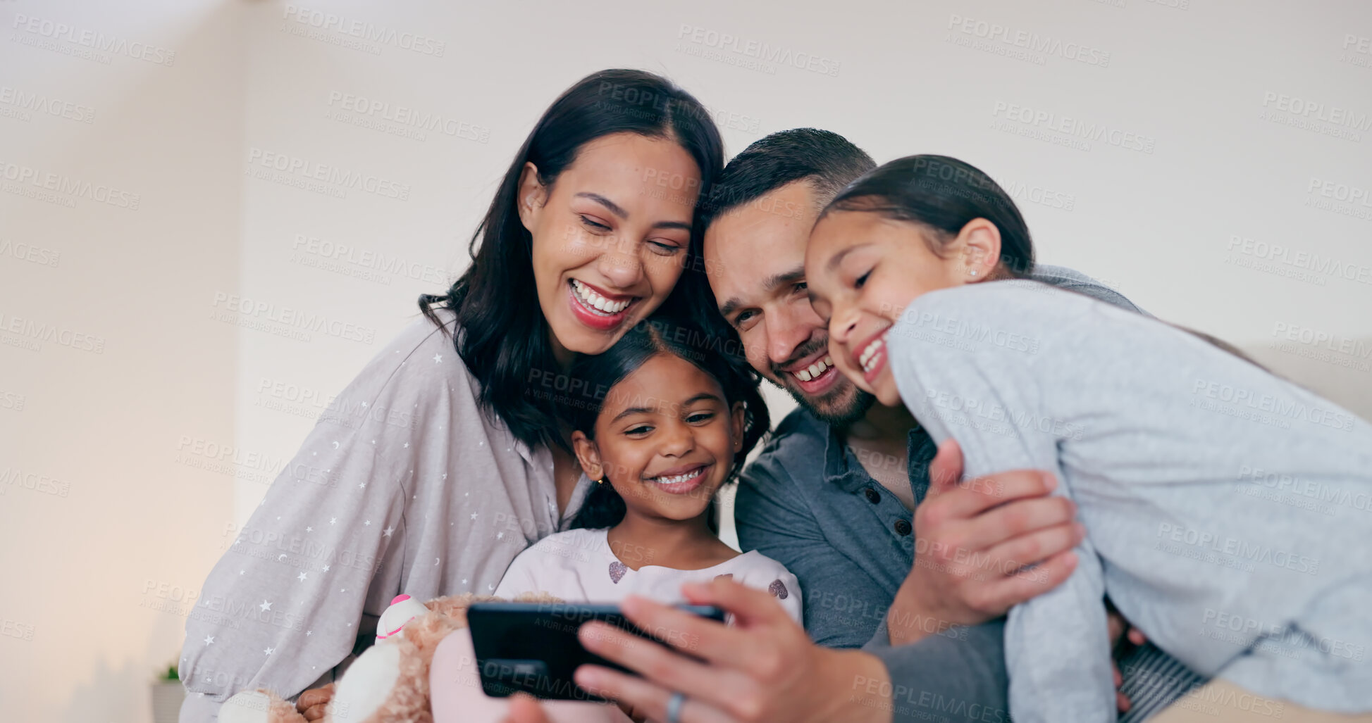 Buy stock photo Happy family selfie, parents and kids in bedroom, hug and bonding together for love or memory in home. Photography, support and mom, dad and children on bed with smile, relax playful fun in house.