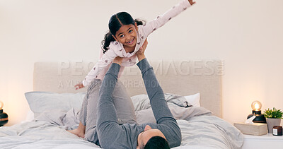 Buy stock photo Father, daughter and bed in home for plane game, bonding or love with care, support and balance. Dad, girl child and happy for playing airplane in bedroom for trust, relax or together in family house