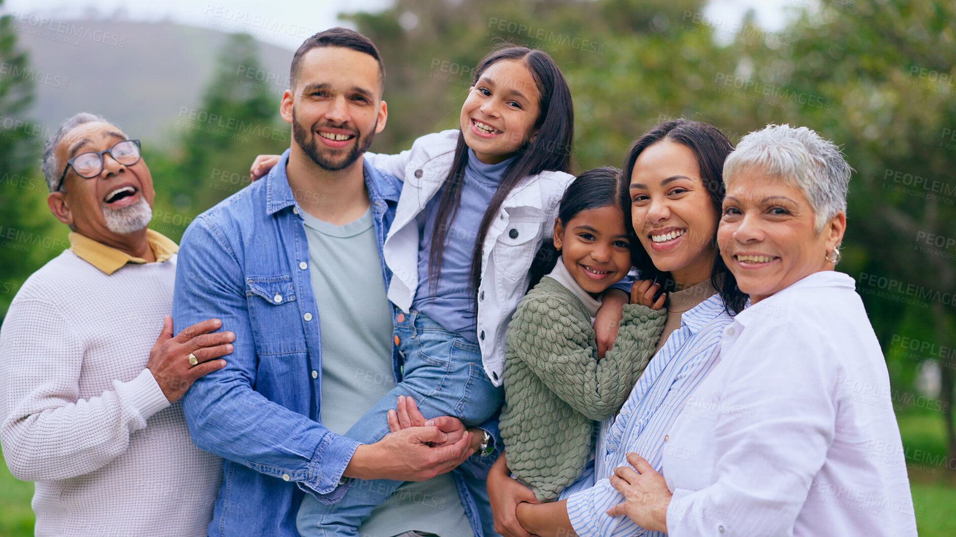 Buy stock photo Park portrait of grandparents, happy kids and parents, smile and bonding adventure in nature. Hug, fun or memory for big family on picnic, men and women with children in garden with love, mom and dad