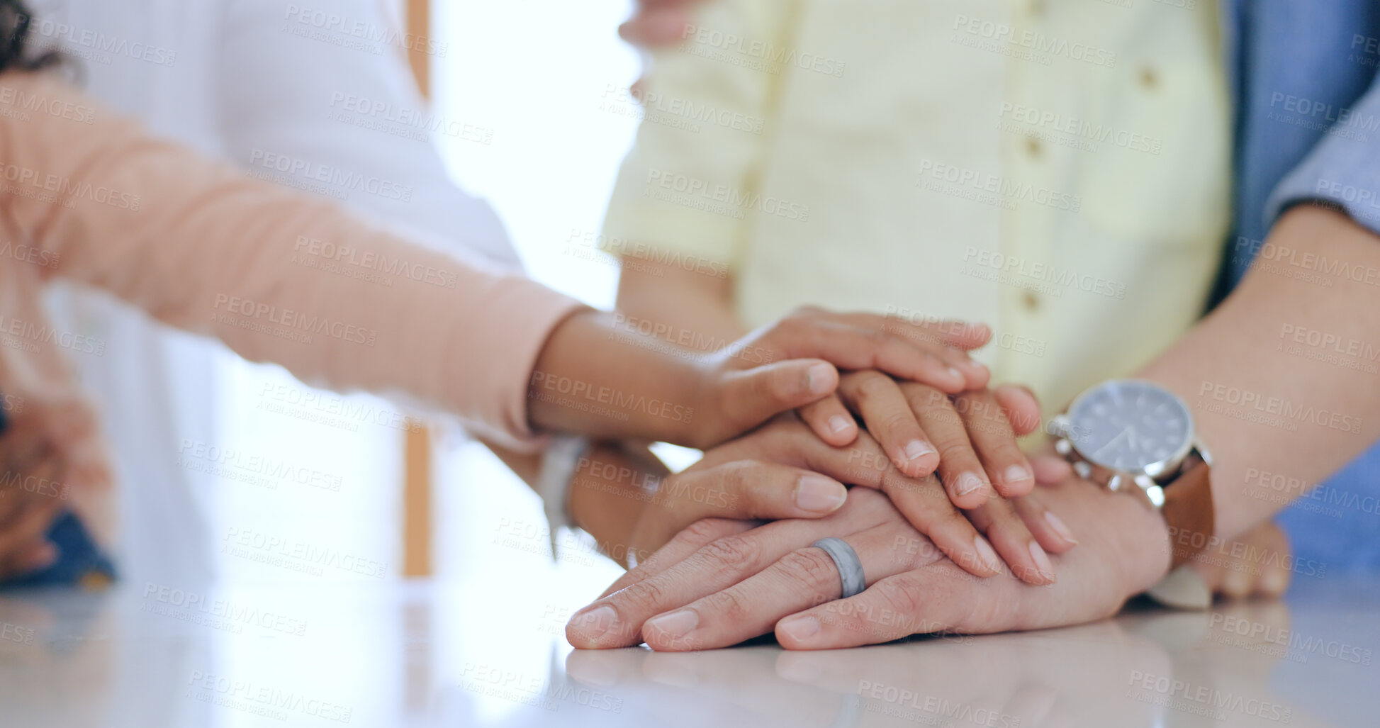 Buy stock photo Family, hands together and holding with closeup in home for trust, support and care. Man, woman and kids with pile for unity, community or collaboration on table in kitchen with generation for future