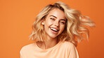 Happy, woman and portrait of a student smiling, for beauty, hair and youth or higher education. Confident, American or European female posing against an orange background in studio