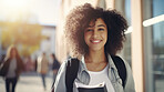 Happy, woman or student portrait smiling wearing a backpack, at university, college or school. Confident, African American , and motivated youth female for studies, learning and higher education