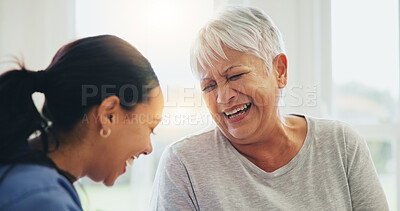 Buy stock photo Happy woman, doctor and senior patient laughing in elderly care for funny joke, humor or comedy at old age home. Nurse or medical caregiver smile or laugh with mature person in bonding at house