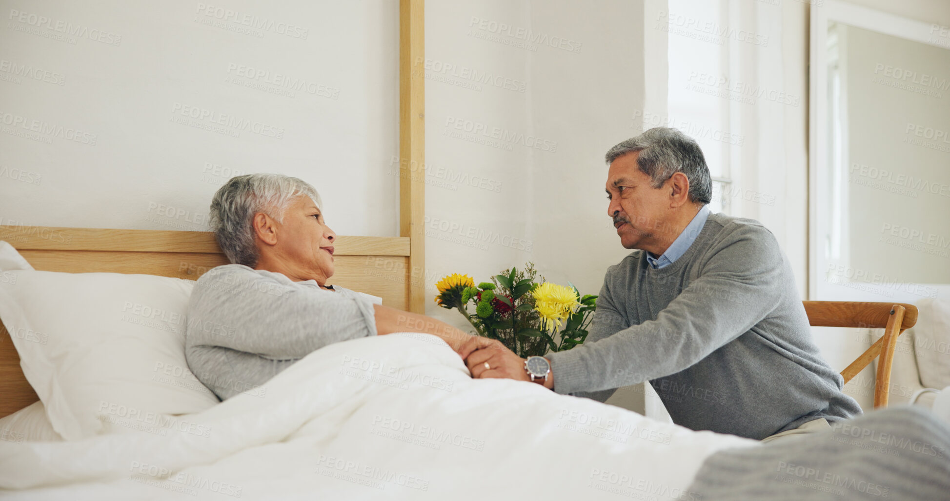 Buy stock photo Wife, bedroom and man sick support for concern comfort or disease illness, virus infection or injury. Woman, husband and hand holding in home for health wellness fear or risk healing, couple as sad