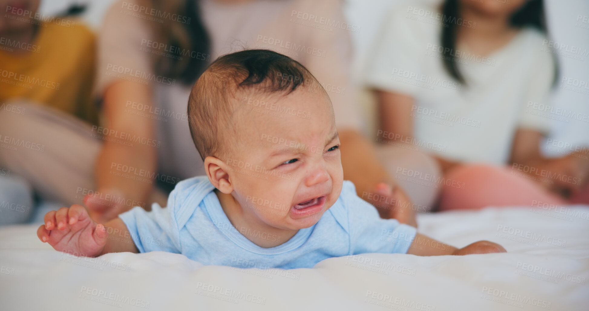 Buy stock photo Crying, sad or baby with mother in bed for comfort, safety and attention while hungry, sick or tired. Noise, angry infant or young child upset with woman babysitter, mommy or nanny in family home