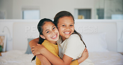 Buy stock photo Sisters, portrait and siblings hug in home with love, care and kids with support on sofa in living room. Happy, face and children bonding in embrace together on couch in lounge of apartment or house