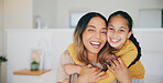 Portrait, family and a woman hugging her daughter in the bedroom of their home in the morning together. Face, love and smile with a young girl embracing her mother while on a bed in their apartment