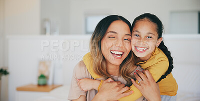 Buy stock photo Portrait, family and a woman hugging her daughter in the bedroom of their home in the morning together. Face, love and smile with a young girl embracing her mother while on a bed in their apartment