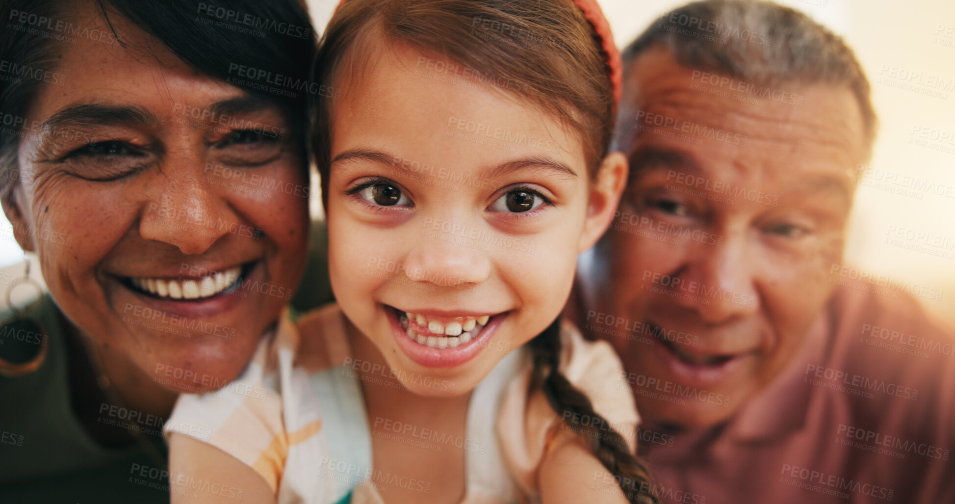 Buy stock photo Selfie, grandparent and child with smile for bond, love or care in home with lens flare. Happy man, woman and little girl for profile picture, social media or post for childhood, memory and together