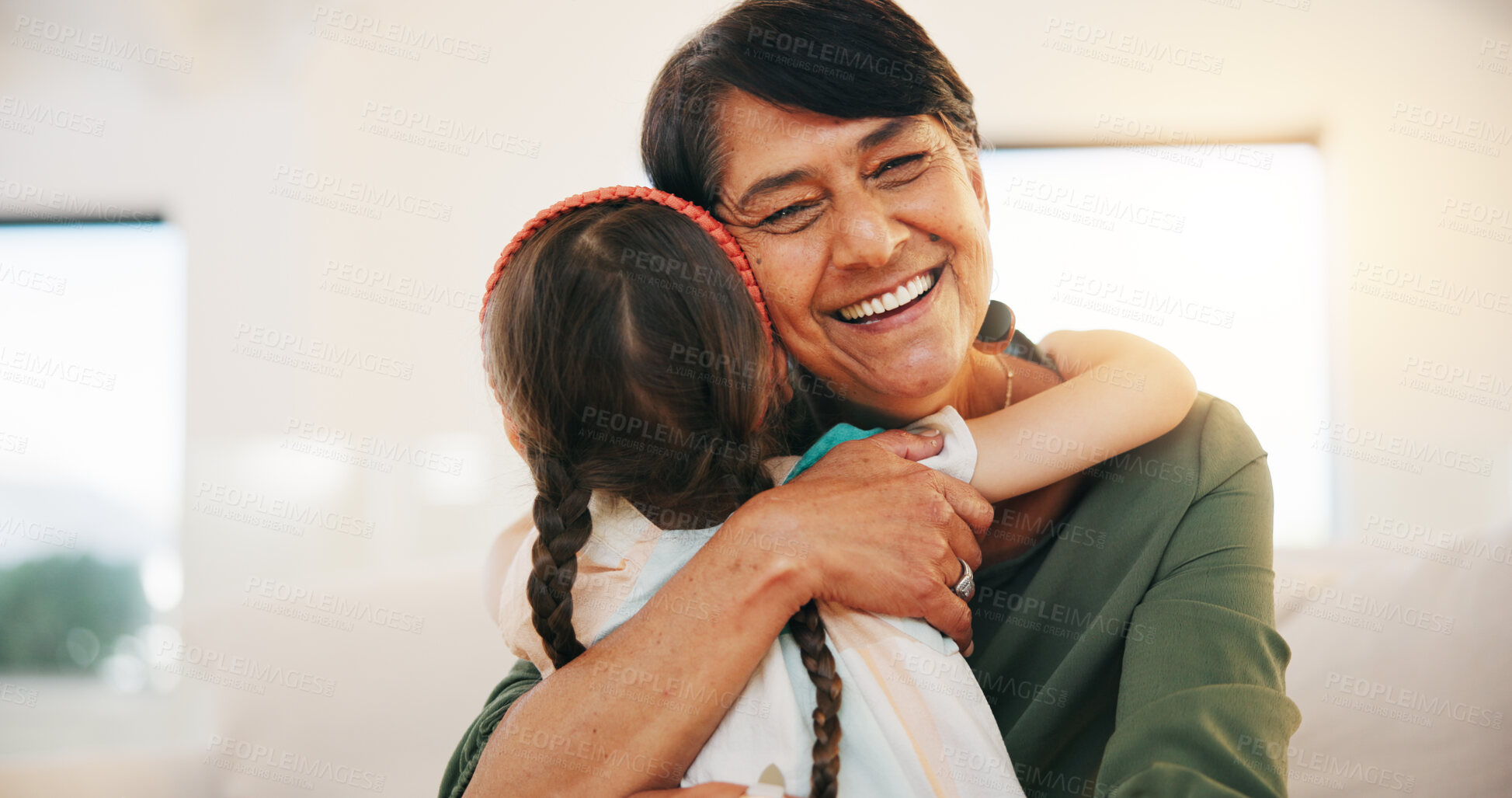 Buy stock photo Child, grandmother and hug for happy smile bonding, relax connection in retirement. Young girl, old woman and embrace for holiday rest or together in lounge for funny joke, love trust or care safety