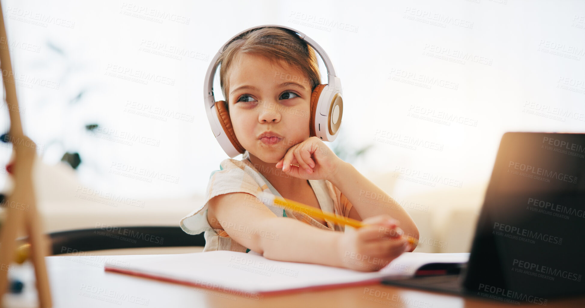 Buy stock photo Thinking, kid on headphones and education, writing in book and homework for homeschool on tablet. Elearning, virtual class and idea of girl child on internet, studying and online lesson for knowledge