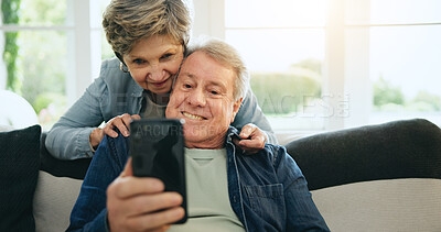 Buy stock photo Phone, senior or happy couple on social media on couch for communication, meme or internet connection. Home, mature man or woman on mobile app to search, relax or scroll online on sofa in living room