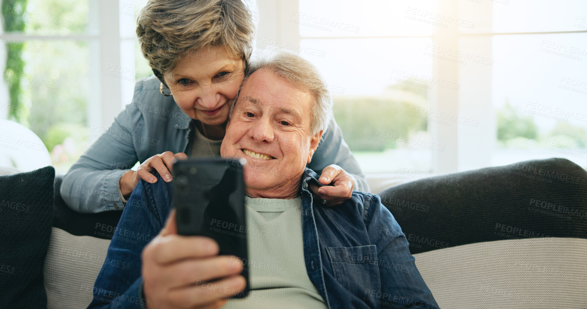 Buy stock photo Phone, senior or happy couple on social media on couch for communication, meme or internet connection. Home, mature man or woman on mobile app to search, relax or scroll online on sofa in living room