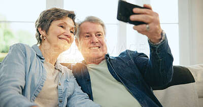 Buy stock photo Happy senior couple, selfie and sofa in living room for photography, memory or picture together at home. Mature man or woman smile in relax for photograph, vlog or social media in retirement at house