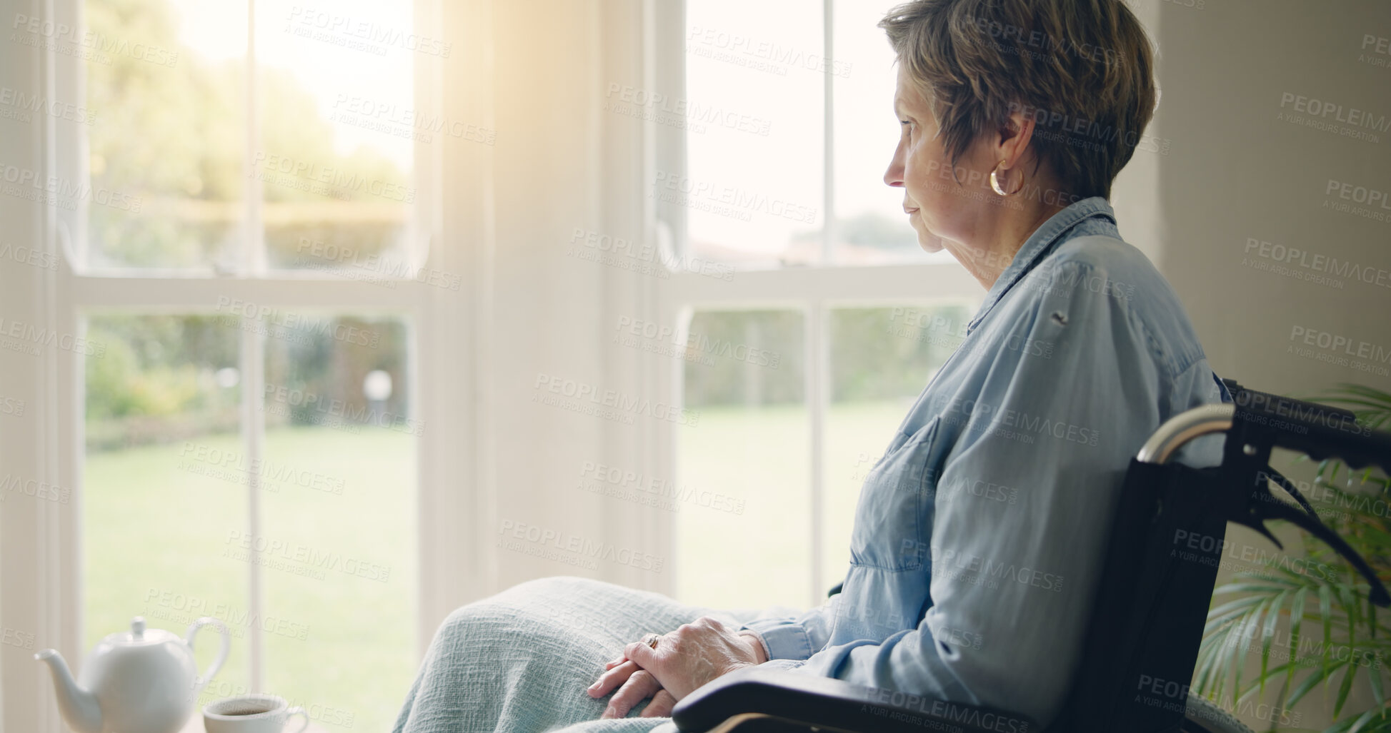 Buy stock photo Wheelchair, senior woman or thinking of memory by window in nursing home or retirement with depression. Grief nostalgia, sad history or lonely mature person in living room to remember past loss