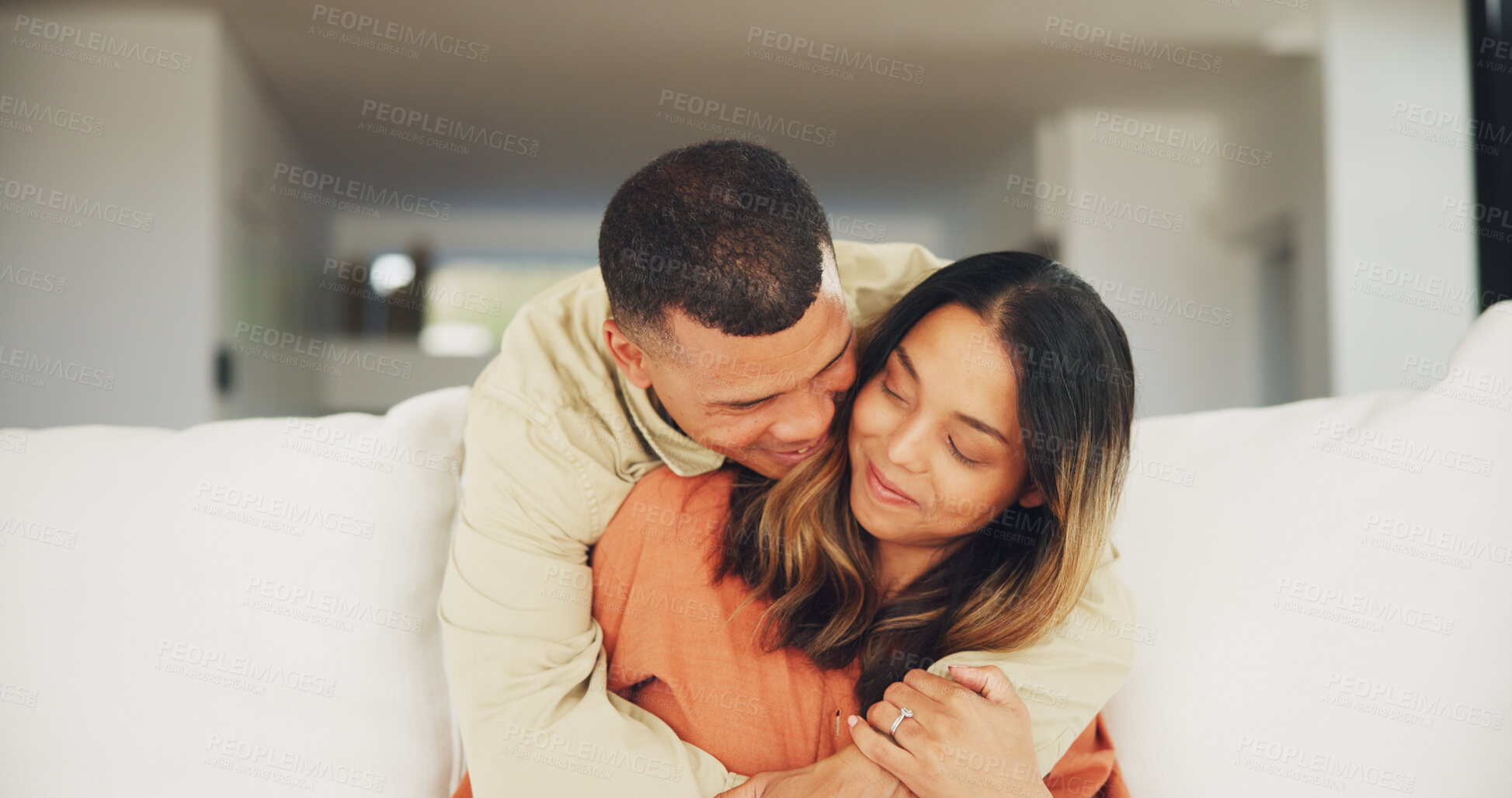 Buy stock photo Couple, happy and living room sofa with hug, marriage and embrace with eyes closed. Home, joyful and love for commitment, bonding together and caring for romantic relationship, man and woman
