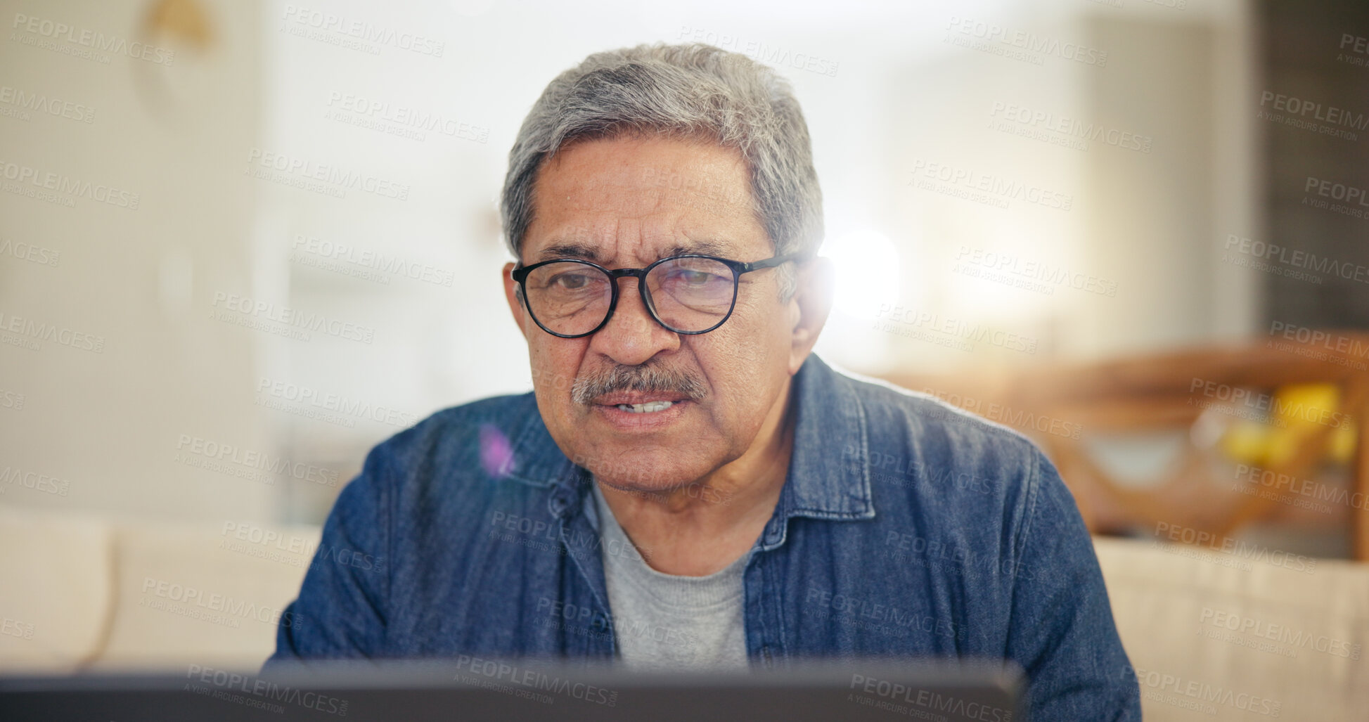 Buy stock photo Laptop, home and senior man online for internet banking, life insurance and mortgage payment. Reading screen, retirement and elderly person on computer for networking, communication and website