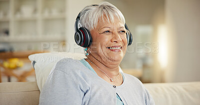 Buy stock photo Senior woman, home and headphones for music, listening to audio and radio podcast on sofa. Happy elderly lady, relax and thinking of peace, streaming sound and multimedia subscription in living room 