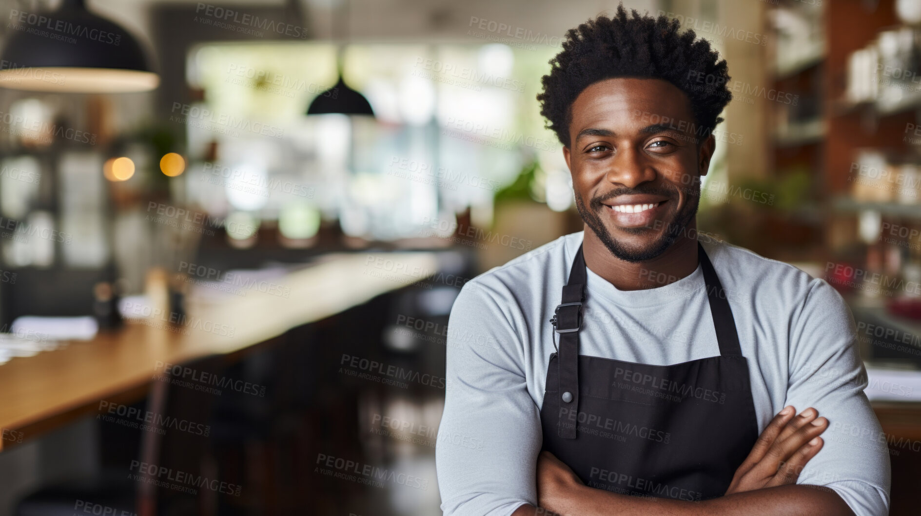 Buy stock photo Waiter, male and portrait of a happy man standing arms crossed in a restaurant kitchen. Confident, skilled and professional worker looking at camera for owner, career or hospitality occupation