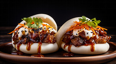 Pork belly, boa bun and asian or snack or street meal on a plate for Japanese, cuisine, and food travel. Delicious, tasty and colourful garnished Gua macro photography, on a black studio background