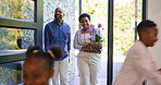 Happy family, children and walk by door in new home in excitement for real estate, property investment or neighborhood. Black man, woman and kids with motion blur for relocation, moving or together