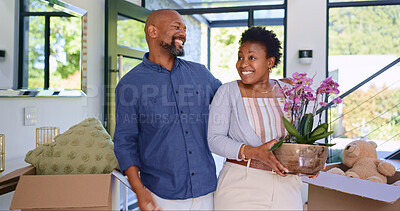 Buy stock photo Couple, flowers and happy in new home or real estate with property investment, fresh start and support. Black people, man and woman with pot plant for moving, mortgage and excited for achievement