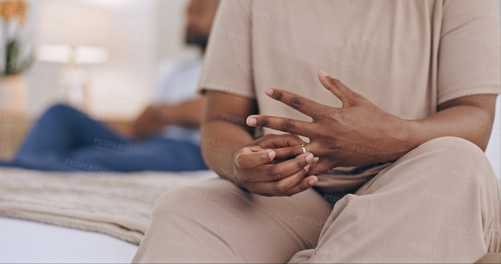 Buy stock photo Black couple, hands and ring in bed, divorce or fight for conflict, argument or disagreement at home. Closeup of African woman or man in bad marriage, toxic relationship or mistake in bedroom dispute