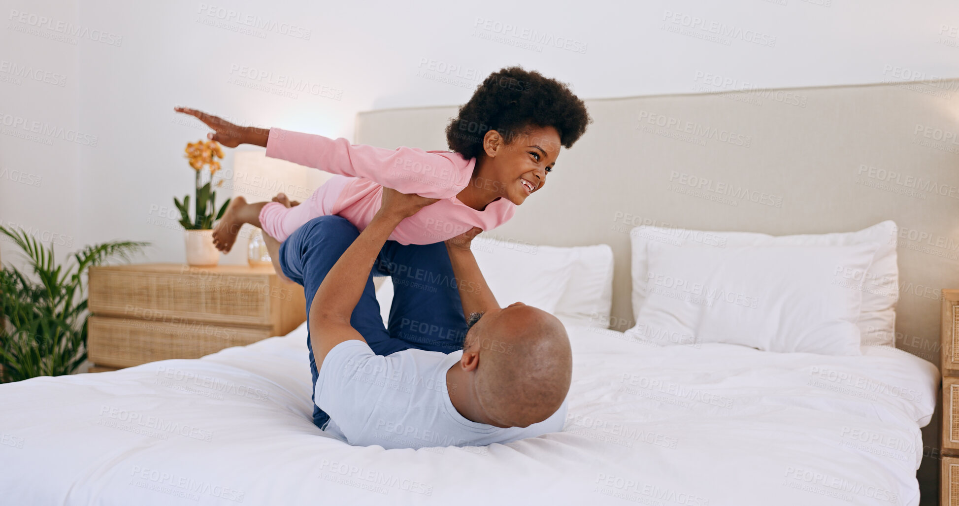 Buy stock photo Bedroom, airplane and black family, father and happy child playing, having fun and enjoy fun flying game for home wellness. Bed, happiness and bonding dad, relax kid or girl imagine plane flight