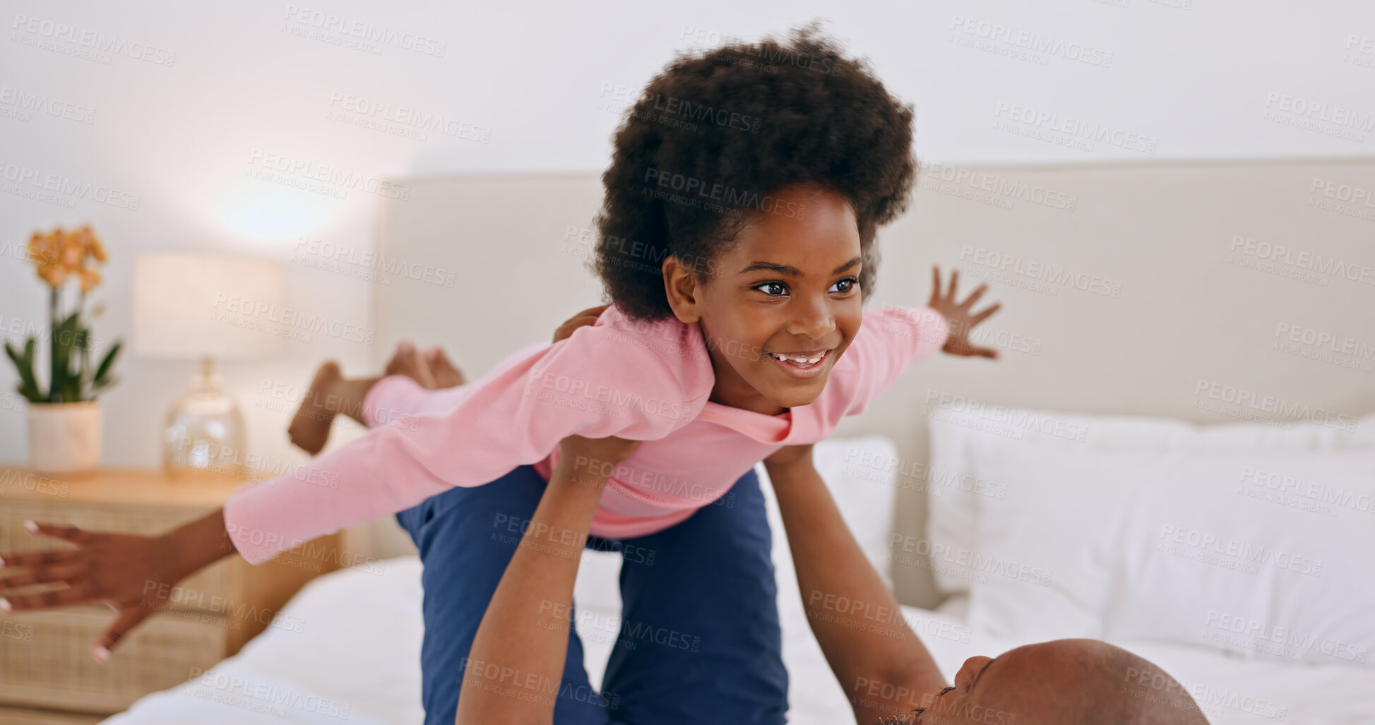 Buy stock photo Bedroom, airplane and happy black family, child and dad playing, having fun and enjoy flying game at home. Bed, love and African papa support, bond or lift kid, girl or daughter imagine plane flight