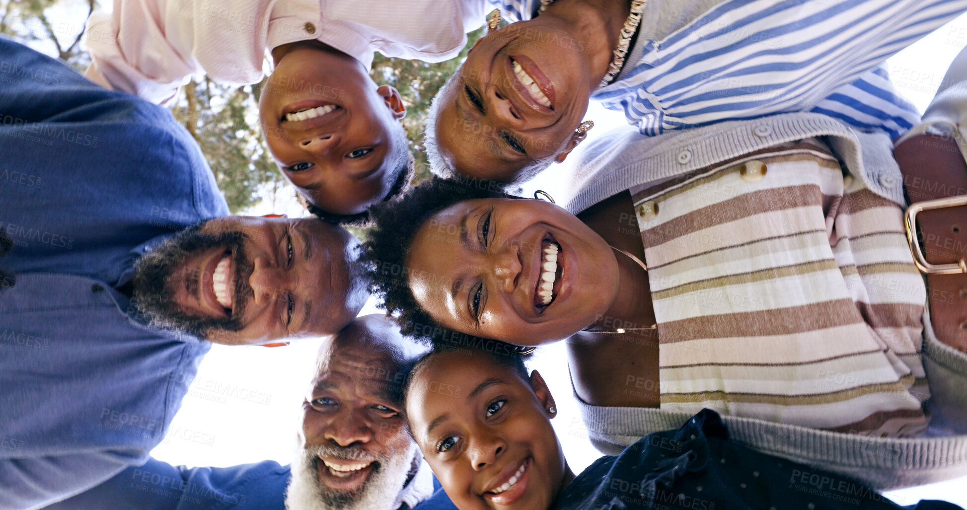 Buy stock photo Happy family, huddle and circle portrait in nature, summer vacation and memory together with love. Black people, grandparents or parents with kids for smile, face or garden for relax bond with below