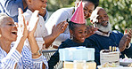 Child, grandparents or black family in backyard for a happy birthday, celebration or growth together. Smile, clapping or excited African people with cake, love or kids in a fun party, nature or park