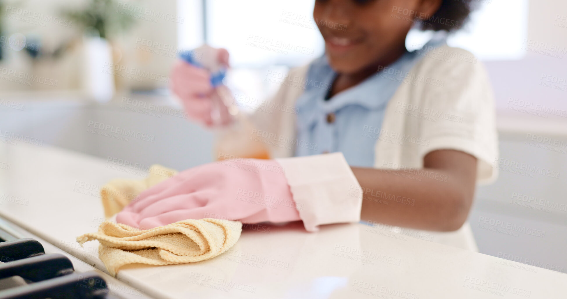 Buy stock photo Happy girl, hands and cleaning table for housekeeping, hygiene or disinfection in chores at home. Closeup of female person, child or kid wipe surface, furniture or kitchen in bacteria or germ removal