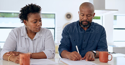Couple, married and together with document in office for signature, paperwork or contract for insurance. Black woman, man and worry for future, finances or savings by cover for safety in security