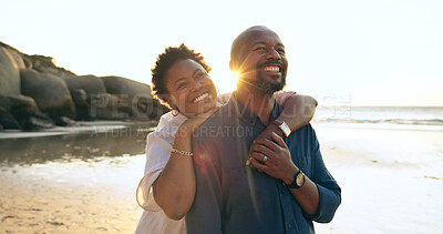 Buy stock photo Couple, hug and happy on beach with love, bonding and sunset for holiday, vacation and relationship. Black people, man or woman with embrace, smile and romance by ocean or sea for travel or adventure