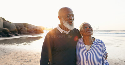 Buy stock photo Senior couple, smile and hug by ocean, love and bonding on vacation, holiday and trip to beach. Happy black people, embrace and support or trust, commitment and connection in marriage or retirement