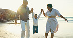 Parents, holding hands and swing child on beach for vacation, holiday and fun game at sunset. Happy family, play and relax together at the sea, ocean and playing on sand with trust, support and care