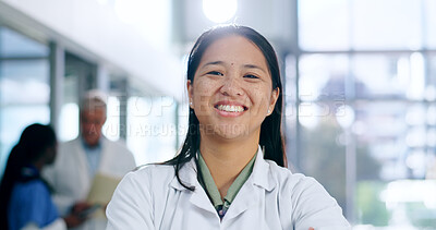 Doctor, woman and portrait with smile in hospital or clinic for healthcare, service or medical support. Medicine, asian person and professional with happy, confident and pride for career or wellness