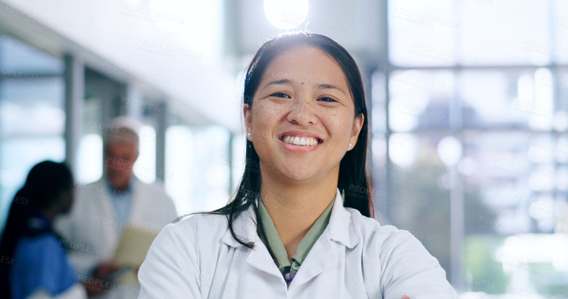 Buy stock photo Doctor, woman and portrait with smile in hospital or clinic for healthcare, service or medical support. Medicine, asian person and professional with happy, confident and pride for career or wellness