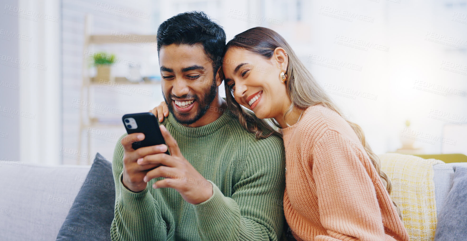 Buy stock photo Couple, living room sofa and texting with phone, smile and click for contact, meme and notification in home. Man, woman and happy with smartphone, reading and app for social network, video and relax