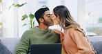 Couple, love and kiss with laptop on sofa for movies, digital subscription and download multimedia show at home. Happy man, woman and relax at computer for affection, online shopping and connection 