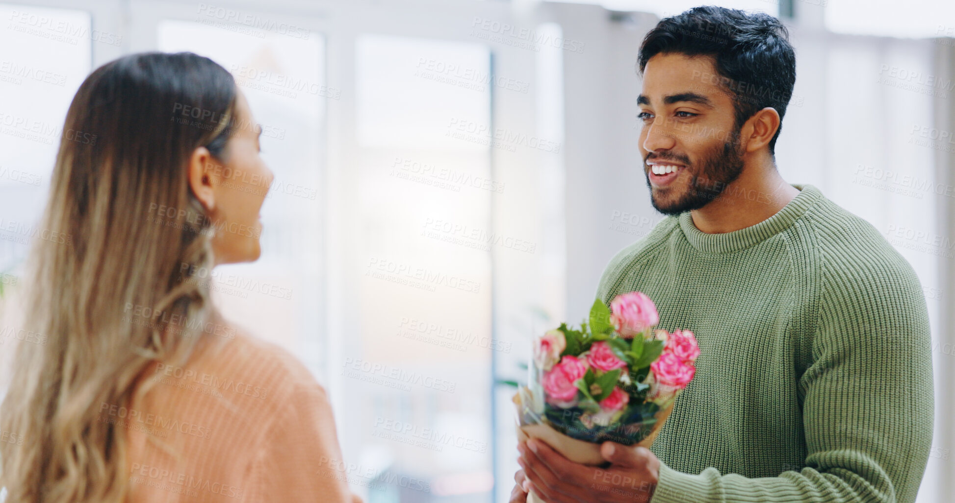 Buy stock photo Man, woman and giving bouquet of roses for smile, care or love for birthday, anniversary or celebration. Couple, flowers and happy for present, gift or surprise for bonding, romance and home together