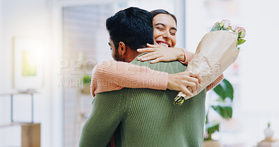 Buy stock photo Man, woman and hug with bouquet of flowers for smile, care or love on birthday, anniversary or celebration. Couple, roses and happy for present, gift or surprise for bonding, romance or home together