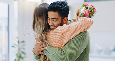 Buy stock photo Man, woman and hug with bouquet in home with roses for smile, care or love on birthday, anniversary and event. Couple, flowers and happy for present, gift or surprise for bonding, romance or together