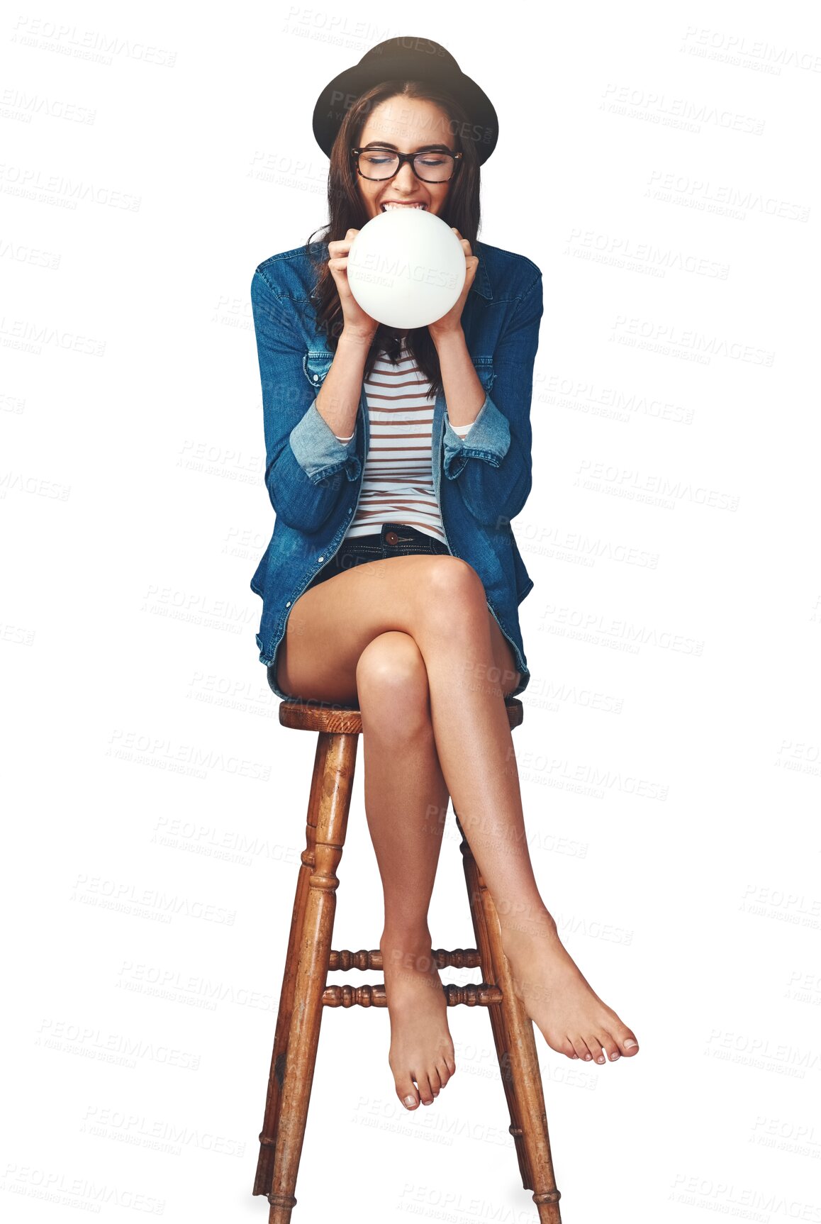 Buy stock photo Blowing, happy and woman with balloon on chair on isolated, png and transparent background. Fashion, excited and person with decoration for party, birthday or celebration in trendy hipster clothes