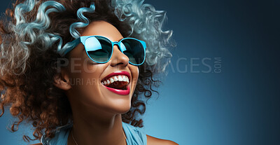 African american woman, glasses and afro with funky colour, studio background, excitement and smile. Mockup space, face or elegant and confident, female posing in fashionable or stylish clothes
