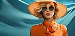 Woman, portrait and glasses with hat, fashion and trendy clothes in elegant style on banner background. Mockup space, face and confident female model with luxury sunglasses on studio color backdrop