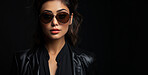 Fashion sunglasses, portrait or serious woman with banner, attitude or mysterious style isolated on black background. Mockup space, face or cool gen z girl model with edgy, trendy or low light studio"